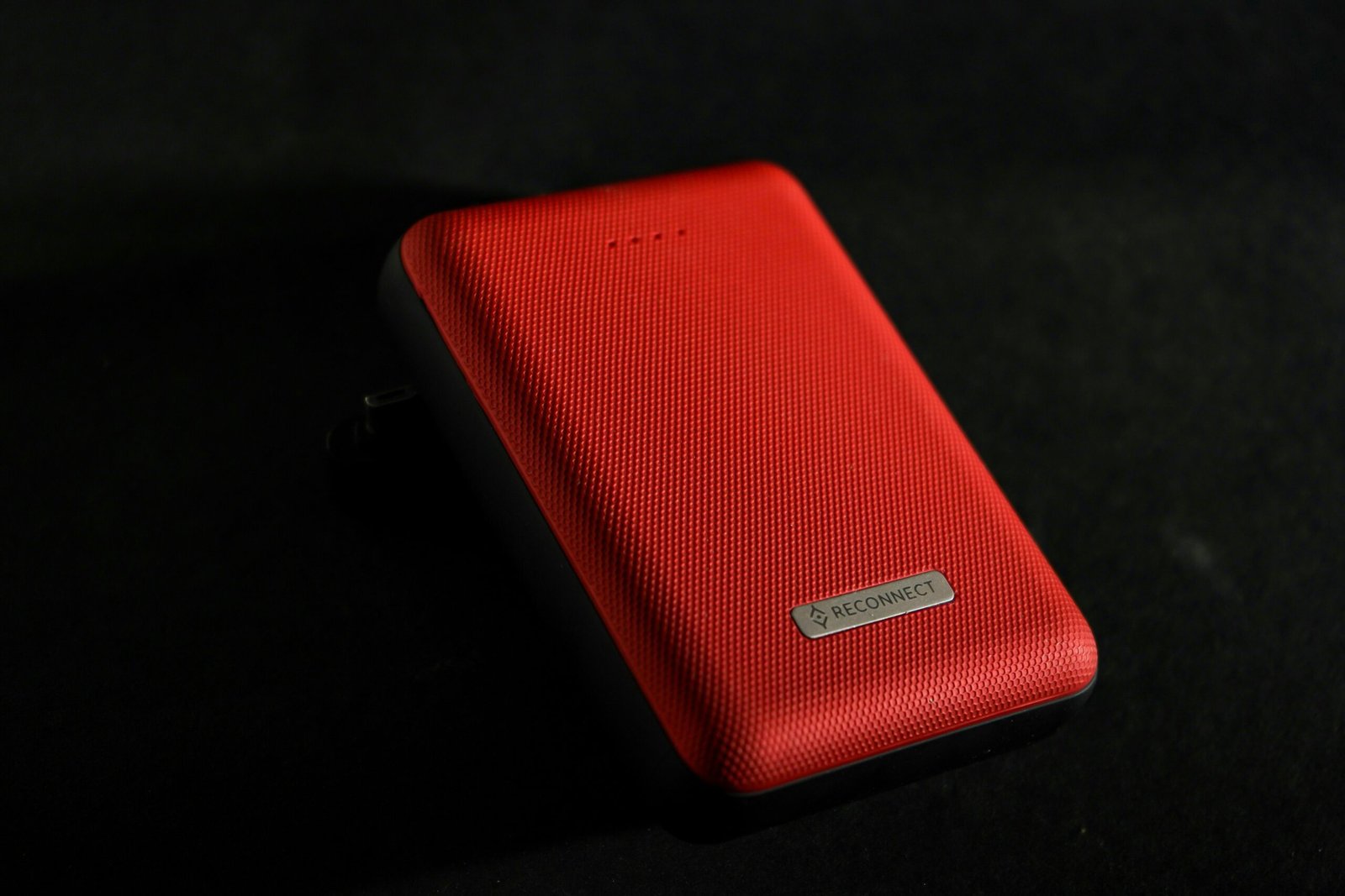 red leather case on black surface